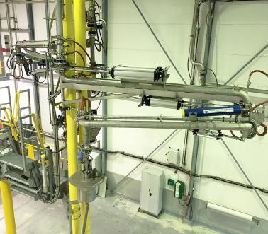 Laadarm voor topbelading met uitgebreid werkgebied, 100% geautomatiseerd, Pacquet