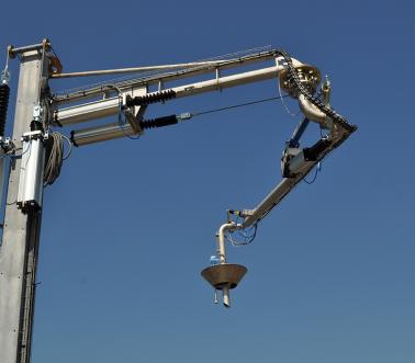All automated fixed-reach top loading arm and positioning cone, Pacquet