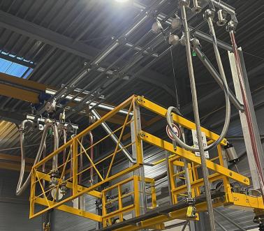 Pacquet, poste de chargement porte flexible 
