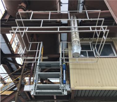 Complete loading solution for bulk applications with safety cage offset to the left, Pacquet