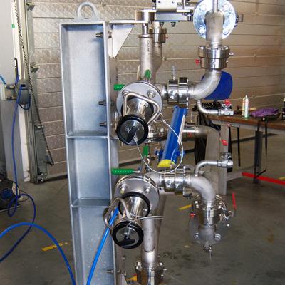 Dubbel lossystem voor bodembelading van vloeistoffen en vloeibare gassen, Pacquet